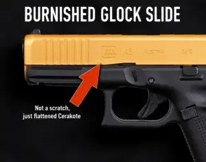 Burnished gold Cerakote Glock slide showing wear that appears as flattened coating, not scratches.